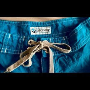 Billabong Women’s board shorts. Nylon. 2 toned bright blue print fabric. Size M